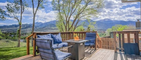 Indulge in the beauty of your surroundings as you unwind by the private backyard fire pit. The tranquil setting offers an ideal backdrop for relaxation, whether you're enjoying the company of loved ones, savoring a warm beverage, or simply taking in the scenic views that this cozy outdoor space provides.