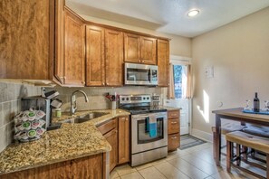 Don't want to go out to eat? No problem! Our kitchen is FULLY stocked with everything from the basics like a Keurig coffee machine to a spice rack, pizza cutter, and an assortment of pots and pans!