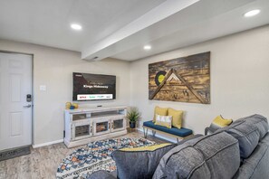 Enjoy our 55" HDTV with Roku in the living area. Great for entertainment!