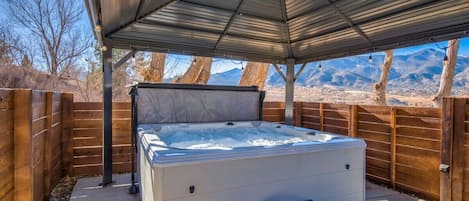 Enjoy the outdoors while relaxing in the hot tub!