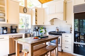 Kitchen space with kitchen island seating.