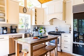 Kitchen space with kitchen island seating.