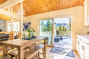 Deck off the open concept kitchen space and beautiful ski slope view!