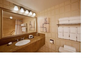 Full bathroom with a shower. Basic toiletries and towels are provided