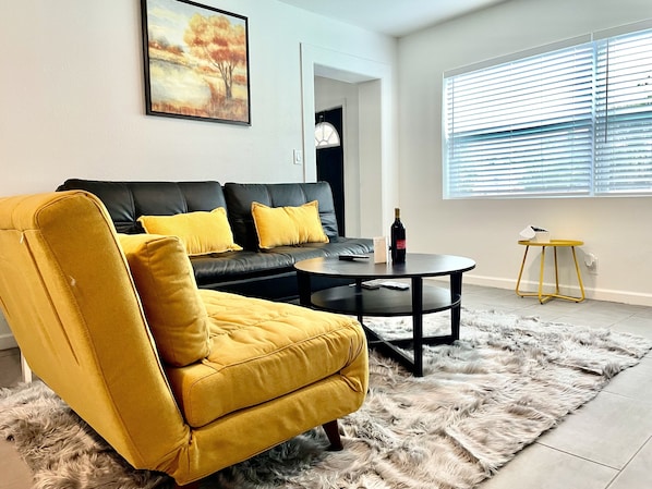 Living room with two sleeping area. 