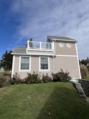 Side view of Sand Dollar with it's second floor balcony.