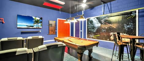 Let your children enjoy this amazing Star Wars theme game room!