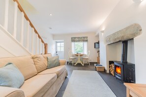 Fellside Cottage sitting room with log burning stove