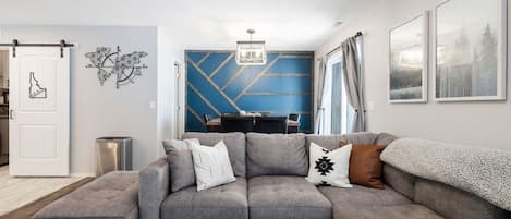 Living area featuring an accent wall made by Matt