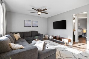 This large sectional pulls out into a Queen sized bed.