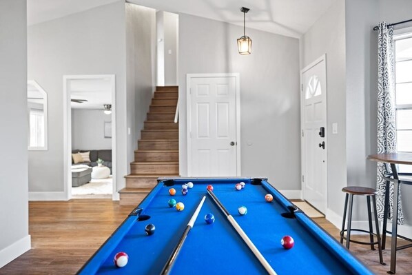 This game table converts into a pool table, air hockey, ping pong, and mini-basketball.