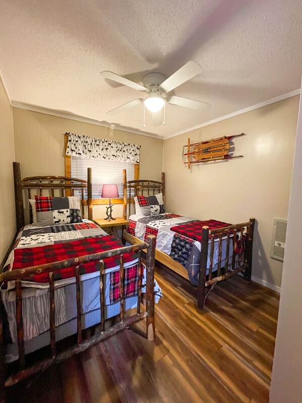 Two twin log beds 