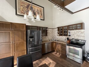 This is the upstairs kitchen.  It is fully equipped with Keurig coffee maker etc