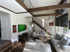 This is the upstairs living room (open concept with kitchen)