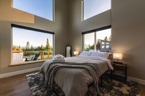 Not only does the living room have incredible views, the master bedroom follows suit. You'll want to extend your stay once you lay down and relax.