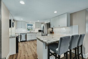 Main House (downstairs): Spacious Kitchen. Large granite counter tops.