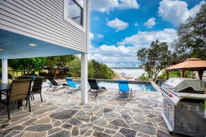 Private pool. BBQ to the right, undercover dining area to the left.