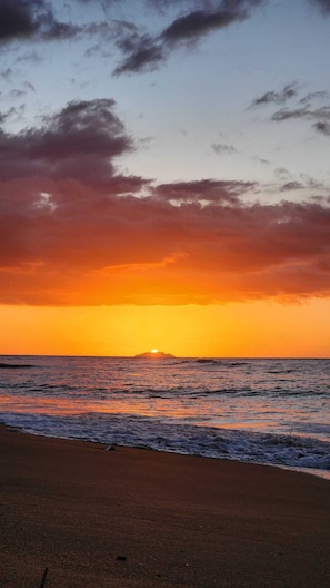Watch as the sun sets over Desecheo island.