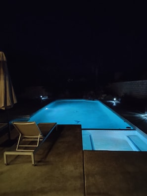 Pool and spa at night time