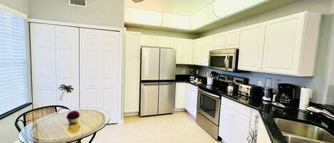 Spacious kitchen with brand new fridge