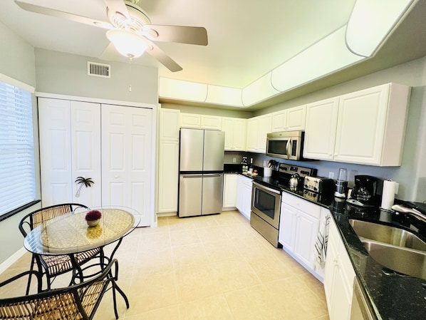 Spacious kitchen with brand new fridge