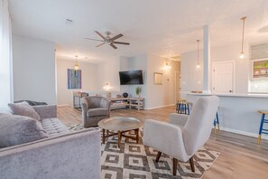 Pure Beauty - Rich decor paired with a harmonious color palette makes the living area the perfect space to plan out your day while enjoying much-needed family bonding time.
