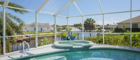 Florida Sun and Fun - The private pool and screened-in patio mean you can laze in luxury or enjoy the refreshing waters at your convenience.