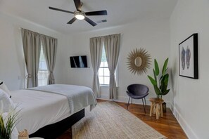 Relax in the cozy bedroom after a day of exploring Memphis and enjoy some natural light coming from the windows