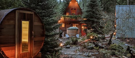 Private dry sauna, cedar soaking tub and landscaped back yard
