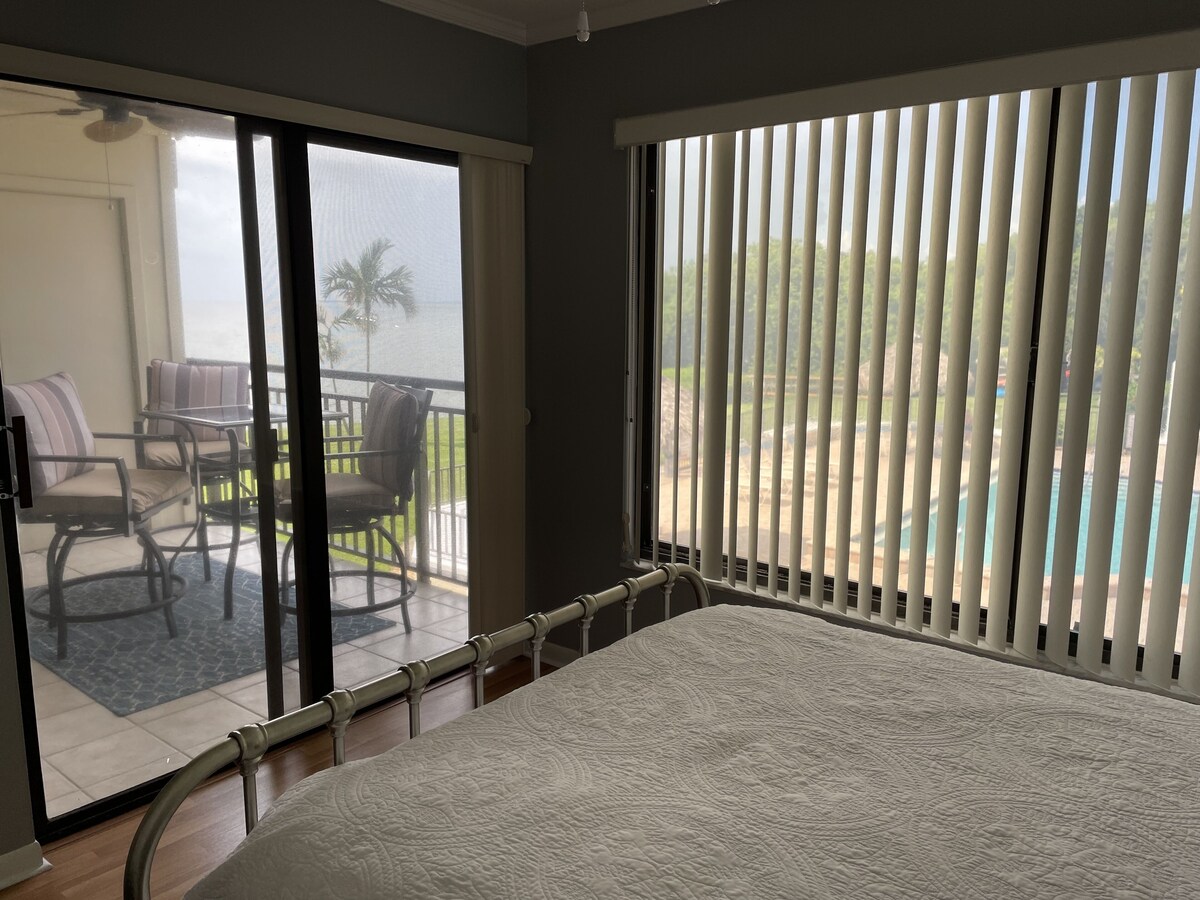 2nd floor condo overlooking pool with a beautiful bay view.