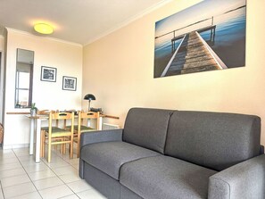 Apartment, Furniture, Floor, Room, Living Room, Picture Frame, Hardwood, Chair, Couch