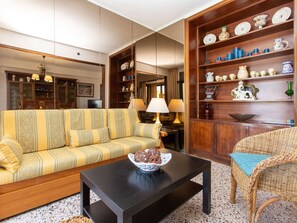 Table, Furniture, Property, Couch, Picture Frame, Wood, Interior Design, Living Room, Shelf, Floor
