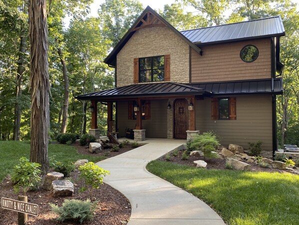 Welcome to Knotty & Nice Chalet on a bluff overlooking a horse pasture