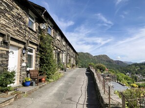 Coniston view external front with Lake District mountain beyond