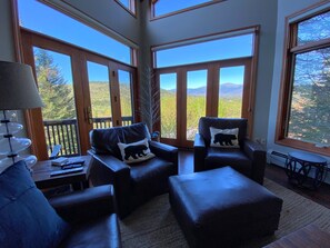Living Room with river rock wood fireplace