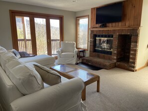 Lower level living area with TV
