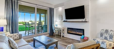 Living Area Featuring Spectacular Views of Amelia Island's Sandy White Beach -  72 Inch Flat Screen TV and Electric Fireplace