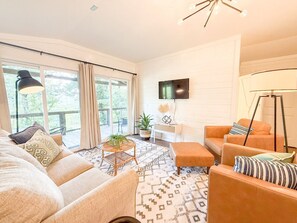 The living room has a queen sleeper sofa for the kiddos.