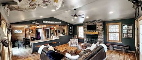 Main living room with real wood fireplace.