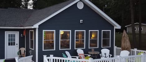 Back Deck overlooking the water.  Panoramic views of the sunrise and sunset.  