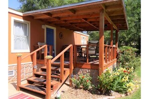 Front porch with seating and grill