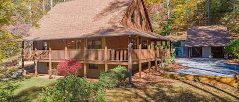 Easy access, plenty of parking, lots of space and wrap-around deck welcomes you!