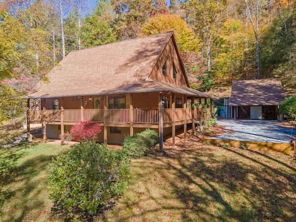 Easy access, plenty of parking, lots of space and wrap-around deck welcomes you!