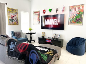 Living room with 65 inch smart tv