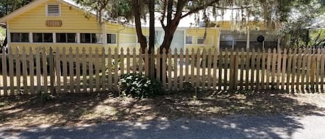 1940's coastal cottage with fenced yard on Shell Banks Bayou and Mobile Bay 