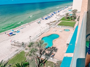 Enjoy breathtaking views from your balcony overlooking the the Gulf and pools.