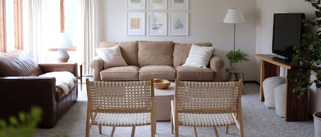 Living room with ample seating for everyone to get comfortable