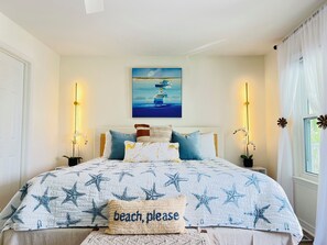 Master bedroom with King new bed and access to balcony.