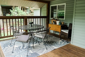 Large covered front porch provides the perfect outdoor eating area!