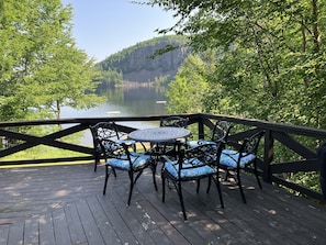 A perfect spot for a morning coffee, secluded by a curtain of trees.